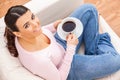 Hispanic Latina Girl Young Woman Relaxing Drinking Cup of Tea or Coffee at Home Royalty Free Stock Photo