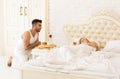 Hispanic Man Bring Breakfast To Sleeping Woman In Morning Tray With Red Rose Flower Royalty Free Stock Photo