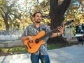 Hispanic man with the guitar on the fest Royalty Free Stock Photo