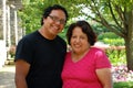 Hispanic man and his mother smiling outdoors Royalty Free Stock Photo