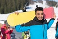 Hispanic Man Hold Snowboard Ski Resort Winter Snow Mountain Cheerful Happy Smiling Guy Royalty Free Stock Photo