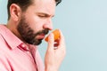 Hispanic man with a loss of sense of smell Royalty Free Stock Photo