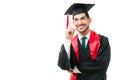 Hispanic man smiling while graduating from university Royalty Free Stock Photo