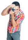 Hispanic man using a vintage looking compact camera Royalty Free Stock Photo