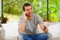 Hispanic man wearing denim jeans with grey sweater Royalty Free Stock Photo