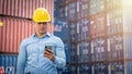 Hispanic manager checking e-mails on a smartphone. Royalty Free Stock Photo