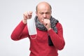 Hispanic mature man having flu and cough. Royalty Free Stock Photo