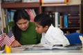 Hispanic Mom and Boy in Home-school Environment Studying Rocks Royalty Free Stock Photo