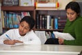 Hispanic Mom and Boy in Home-school Setting Royalty Free Stock Photo