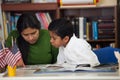 Hispanic Mom and Boy in Home-school Setting Studying Rocks Royalty Free Stock Photo