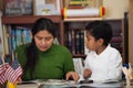 Hispanic Mom and Boy in Home-school Setting Studying Rocks Royalty Free Stock Photo