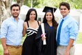 Hispanic Student And Family Celebrating Graduation Royalty Free Stock Photo