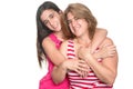 Hispanic teen girl hugging her mother and smiling Royalty Free Stock Photo