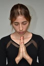 Hispanic Teenage Female Praying