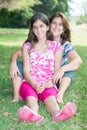 Hispanic teenage girl and her mother at a beautiful park Royalty Free Stock Photo