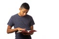 Hispanic Teenager Boy Searching the Pages of History Book