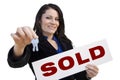 Hispanic Woman Holding Sold Sign and Keys On White Royalty Free Stock Photo