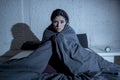 Hispanic woman at home bedroom lying in bed late at night trying to sleep suffering insomnia Royalty Free Stock Photo