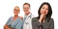 Hispanic Woman with Male Doctor and Nurse Royalty Free Stock Photo