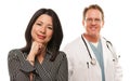 Hispanic Woman with Male Doctor or Nurse Royalty Free Stock Photo