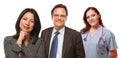 Hispanic Woman with Man and Female Doctor or Nurse Royalty Free Stock Photo
