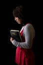 Hispanic Woman Praying Holding the Bible Royalty Free Stock Photo