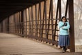 Hispanic Woman Praying And Holding Bible On A Bridge Royalty Free Stock Photo