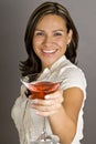 Hispanic Woman Toasting with a Martini Royalty Free Stock Photo