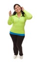 Hispanic Woman In Workout Clothes with Music Player and Headphones