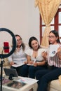 Hispanic women at an online conference. Women entrepreneurs are analyzing the data table Royalty Free Stock Photo