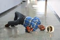 Hispanic Worker Falling on Floor