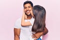 Hispanic young family of father and daughter hugging together with love Royalty Free Stock Photo