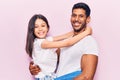 Hispanic young family of father and daughter hugging together with love Royalty Free Stock Photo