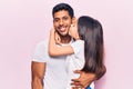 Hispanic young family of father and daughter hugging together with love Royalty Free Stock Photo