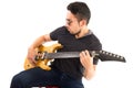 Hispanic young man playing electric guitar Royalty Free Stock Photo