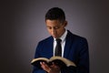 Hispanic Young Teenager Boy Searching the Scriptures, The Word of God, The Bible Royalty Free Stock Photo