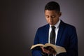 Hispanic Young Teenager Boy Searching the Scriptures, The Word of God, The Bible