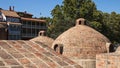 Historic ancient round building surrounded by a forest Royalty Free Stock Photo