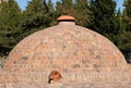 Historic ancient round building surrounded by a forest Royalty Free Stock Photo