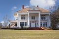 Historic Antebellum Home With Blue Sky and Clouds Royalty Free Stock Photo