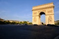 Historic Arc de Triomphe under a sunny sky in Paris, France