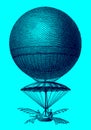 Historic balloon by Jean-Pierre Blanchard from 1785 descending in front of a blue background Royalty Free Stock Photo