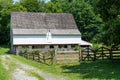 Historic Barn with Split Rail Fence Royalty Free Stock Photo