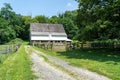 Historic Barn with Split Rail Fence Royalty Free Stock Photo