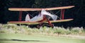 Historic biplane on an airfield Royalty Free Stock Photo