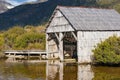 Historic boat shed at lake Dove on sunny day Royalty Free Stock Photo