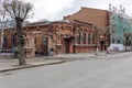 Historic brick building of the city hospital of the Society of Doctors 1888 against the background of the renovated House of Royalty Free Stock Photo