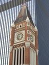 Historic Brick Church Clock Tower and Modern Office Tower,  Perth,  Western Australia Royalty Free Stock Photo