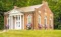 Historic brick and white rural village town hall