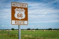 Historic brown and white sign on US Route 66 in Oklahoma Royalty Free Stock Photo